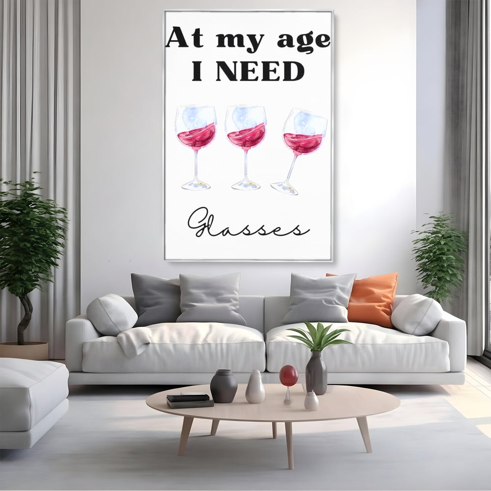 Tablou canvas cu tablou canvas cu pahare de vin si mesaj, in rama de aluminiu argintiu, pe perete intr-un living